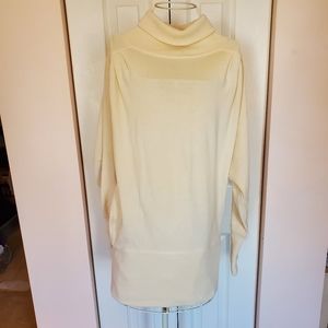 100% wool, creme color turtle neck tunic size Small